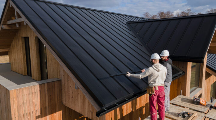 full-shot-roofers-working-together-with-helmets